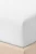 Przescieradlo-Jersey-biale-2-Spod-Igly-i-Nitki.webp